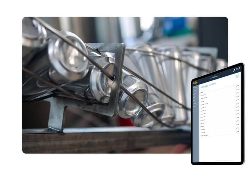 Composite image of a beer can factory line with the Ollie software dashboard featured on a tablet device