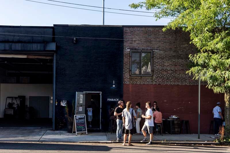 People waiting outside of the Finback Brewing brewery location