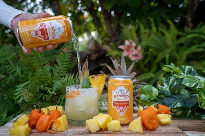 A promotional photo of the pineapple habanero ready-to-drink margarita from Stone Brewing