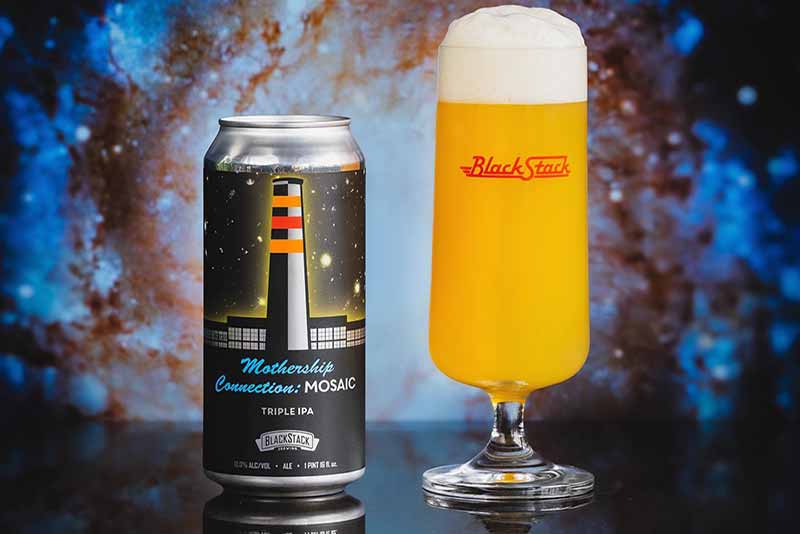 A promotional photo of Mothership Connection: Mosaic, a Triple IPA from BlackStack Brewing