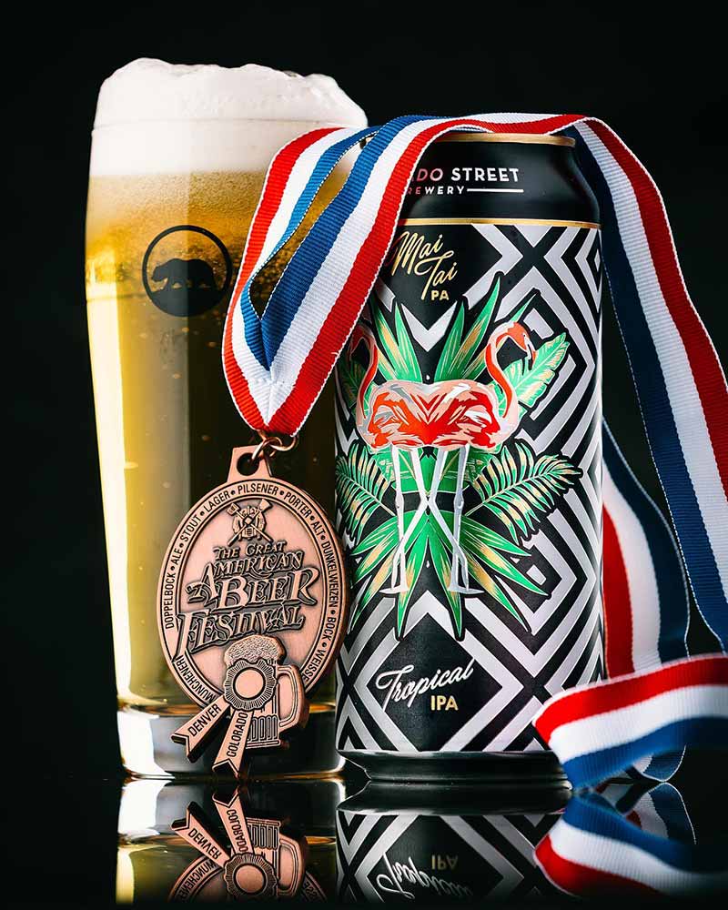 A photo of a can of Mai Tai PA from Alvrardo Street Brewery with a Great American Beer Festival medal