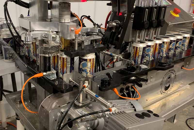 A photo of a craft beer canning line from Microcanner