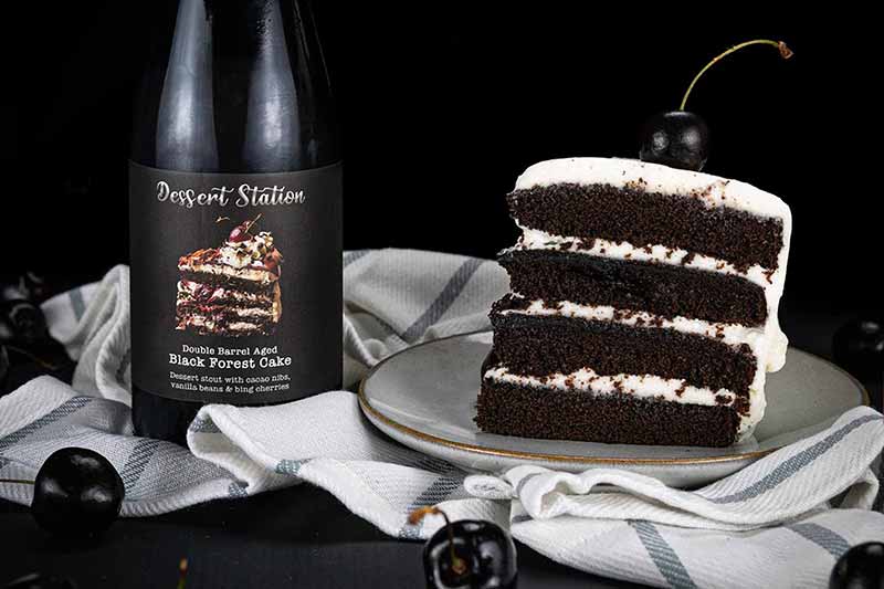 A promotional photo of Black Forest Cake a Dessert Station pastry stout from Corporate Ladder Brewing