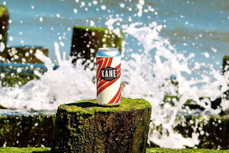 A promotional photo for Fresh Hot Coat, a hazy IPA from Kane Brewing
