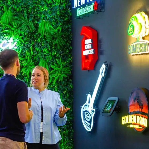 Dekkers trad show booth with various LED neon signs